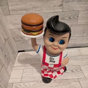 Retro Action piggy Bank Figure with Red and White Checkered Outfit